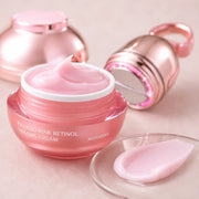 Macro view of the pink Filligio retinol cream texture with the EMS device