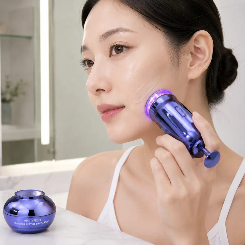 Woman gliding MEDITHERAPY Inmotox Suction Jet along her jawline