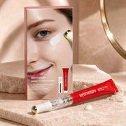 MEDITHERAPY Wrinkle-Fit eye cream and massage device on blush stone