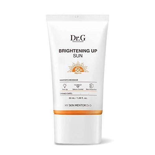 ProtoClinical k-beauty Dr.G Brightening Up Sun SPF50+ PA+++ 50ml single upright pale beige sunscreen tube centered on a light background with soft peach side accents