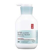 ProtoClinical k-beauty ILLIYOON Ceramide Ato Lotion 350ml single centered pale blue lotion bottle on a white background with soft blue side accents.