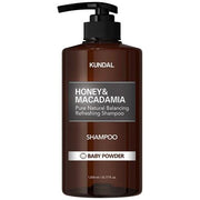 ProtoClinical k-beauty KUNDAL HONEY & MACADAMIA Natural Shampoo (Baby Powder) 1058ml single tall warm brown shampoo bottle centered on a white background with pale aqua side accents.