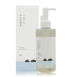 ProtoClinical k-beauty ROUND LAB 1025 DOKDO CLEANSING OIL 200mL single cleansing oil bottle centered upright on a light background