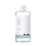 ProtoClinical k-beauty ROUND LAB 1025 Dokdo Cleansing Water 400mL single cleansing water bottle on a light background
