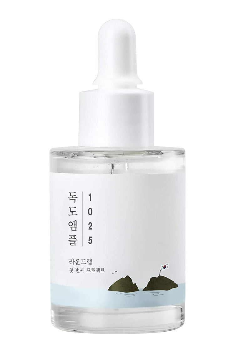 ProtoClinical k-beauty gray beauty product silhouette with soft side extensions on a white background.