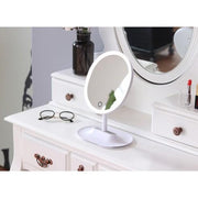 ProtoClinical k-beauty dark gray beauty product packaging on a light background.