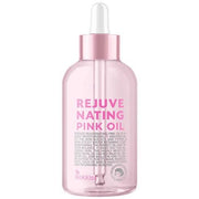 ProtoClinical k-beauty Rokkiss Rejuvenating Pink Oil 55ml single upright oil bottle on a light background.