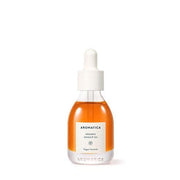 ProtoClinical k-beauty AROMATICA Organic Rosehip Oil 30ml single upright amber oil bottle with a rounded base on a white background with soft blue and peach side shading