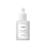 ProtoClinical k-beauty warm beige beauty product silhouette on a light background.