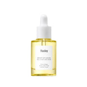 ProtoClinical k-beauty Huxley Oil ; Light and More 30ml in a soft sage and cream beauty product silhouette on a light background