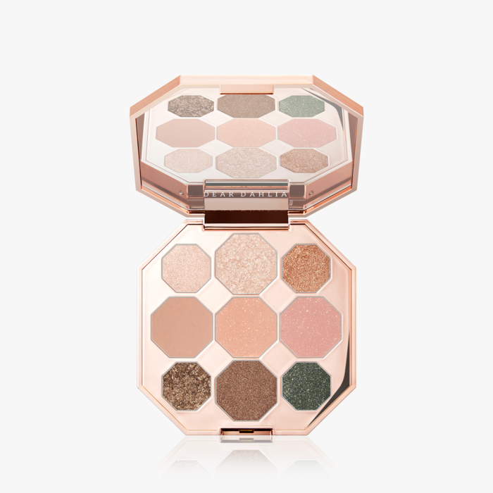 ProtoClinical k-beauty beauty close-up on a pale background in muted dusk-toned neutrals.