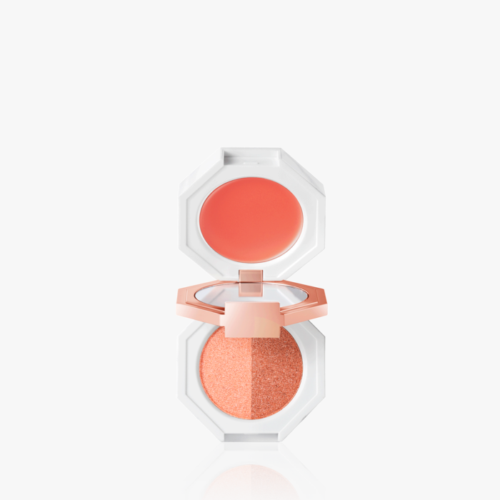 ProtoClinical k-beauty slim coral skincare product on a pale aqua background.