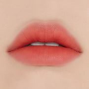 ProtoClinical k-beauty ETUDE HOUSE Fixing Tint 4g #03 Mellow Peach horizontal peach swatch with a warm coral center on a soft beige background