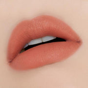 ProtoClinical k-beauty ETUDE HOUSE Fixing Tint 4g #04 Ginger Milktea horizontal berry swatch with a warm peach center on a soft beige background.