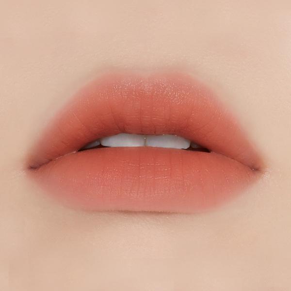 ProtoClinical k-beauty ETUDE HOUSE Fixing Tint 4g #04 Ginger Milktea horizontal berry swatch with a warm peach center on a soft beige background.