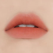 ProtoClinical k-beauty ETUDE HOUSE Fixing Tint 4g #04 Ginger Milktea horizontal berry swatch with a warm peach center on a soft beige background.