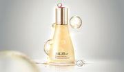 ProtoClinical k-beauty su:m37 Secret Essence 80ml product packaging with blue-gray side shading on a light background.