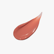 ProtoClinical k-beauty [DEAR DAHLIA] BLOOMING EDITION Satin Glow Lip Stain 5.5g #01 Serenity shown as a soft rosy pink lip color swatch centered on a clean white background with pale aqua side accents