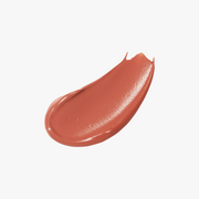 ProtoClinical k-beauty soft rose-brown beauty close-up with a centered diamond-shaped form on a pale background.