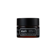 ProtoClinical k-beauty KLAIRS Midnight Blue Calming Cream 30ml charcoal cream jar silhouette on a white background with soft beige side tones.