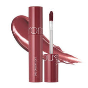 ProtoClinical k-beauty rom&nd JUICY LASTING TINT 5.5g (4 Colors) shown in a rosy shade detail graphic with soft pink swatch blocks, dark tint shapes, and pale green corner accents