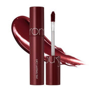 ProtoClinical k-beauty rom&nd JUICY LASTING TINT 5.5g (4 Colors) shown in a rosy shade detail graphic with soft pink swatch blocks, dark tint shapes, and pale green corner accents