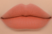 ProtoClinical k-beauty 3CE Soft Matte Lipstick 3.5g (Warm VS Cool) (6 Colors) close-up of matte soft coral lips filling the frame on a skin-toned background