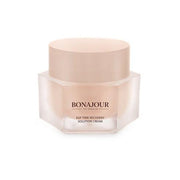 ProtoClinical k-beauty warm beige beauty packaging with pale aqua side panels on a light background.