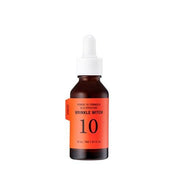 ProtoClinical k-beauty It'S SKIN [NEW] Power 10 Formula Q10 Effector 30ml as a single upright serum bottle centered on a white background with soft pink side accents