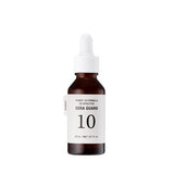 ProtoClinical k-beauty It'S SKIN [NEW] Power 10 Formula VB Effector 30ml as a single upright gray serum bottle centered on a white background with soft beige side accents