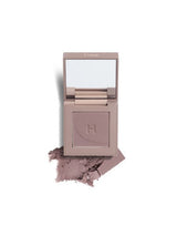 ProtoClinical k-beauty mauve gray beauty product silhouette on a light background with pale blue lower corners.