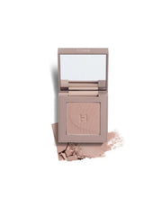 ProtoClinical k-beauty warm beige beauty product silhouette centered on a light background with pale blue lower corners.