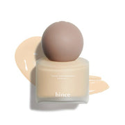 ProtoClinical k-beauty beige beauty bottle silhouette centered on a white background with pale mint side tones.