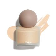 ProtoClinical k-beauty beige beauty bottle silhouette centered on a white background with soft mint side tones.