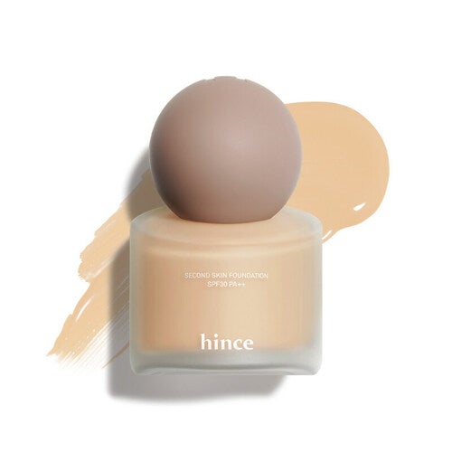 ProtoClinical k-beauty warm beige beauty product silhouette with a soft brown center on a light background.