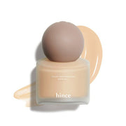 ProtoClinical k-beauty warm beige beauty product silhouette with a soft brown center on a light background.