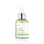 ProtoClinical k-beauty iUNIK Tea Tree Relief Serum 50ml clear glass serum bottle with green liquid, white label, and dropper cap on a light background