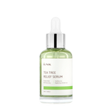 ProtoClinical k-beauty iUNIK Tea Tree Relief Serum 50ml clear glass serum bottle with green liquid, white label, and dropper cap on a light background