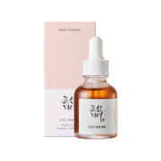 ProtoClinical k-beauty [Beauty of Joseon] Revive Serum: Ginseng + Snail Mucin 30ml single upright warm brown serum bottle centered on a white background with soft blush side shading