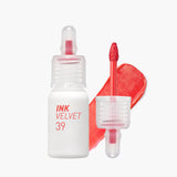 ProtoClinical k-beauty peripera Ink Airy Velvet 4g (NEW #35~#39) two upright lip tint package silhouettes with a slim peach tube beside a taller brown rectangular box on a pale blue and white background