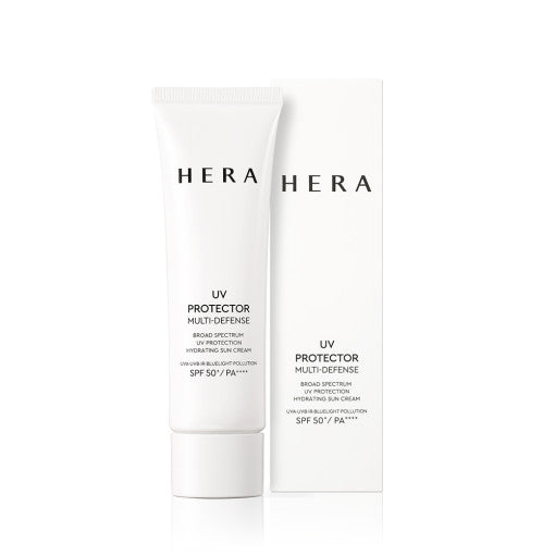 ProtoClinical k-beauty HERA UV PROTECTOR MULTI-DEFENSE SPF50+ / PA++++ 50ml beige sunscreen tube on a light background.