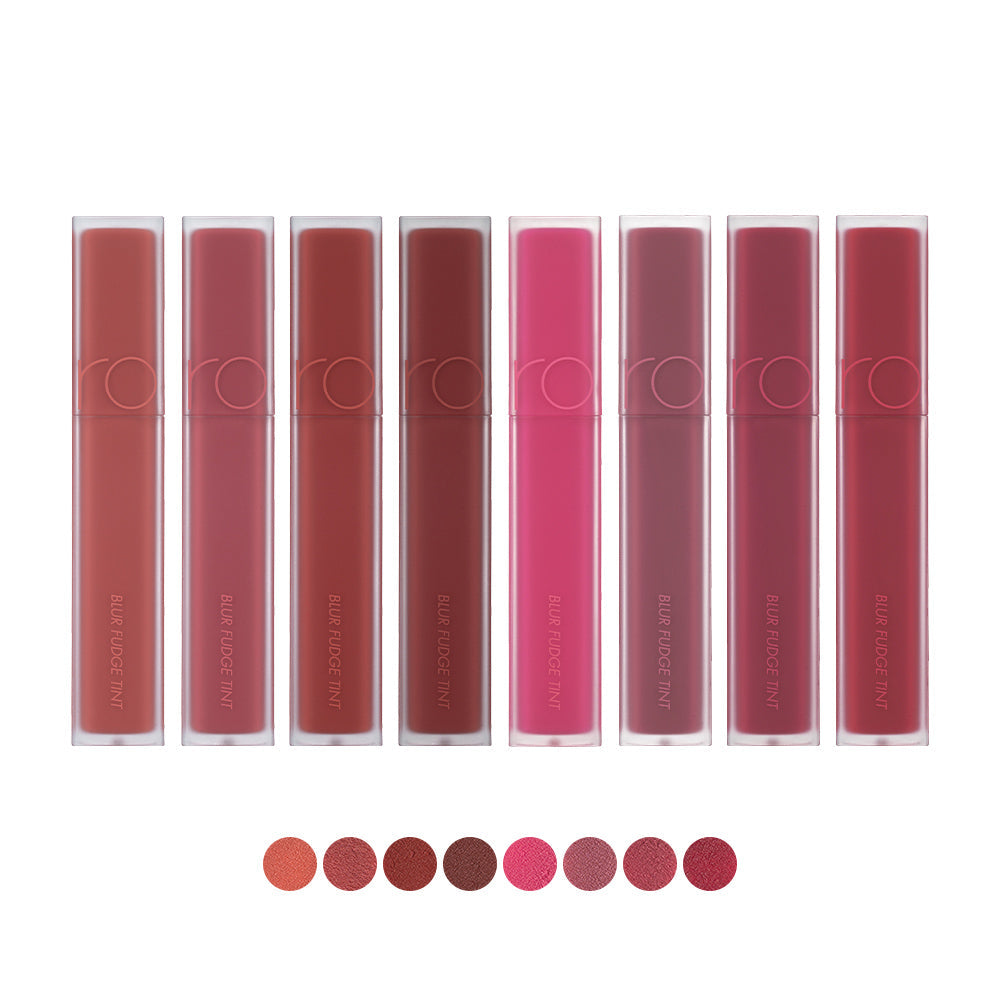ProtoClinical k-beauty rom&nd Blur Fudge Tint (11 Colors) with multiple rosy lip tint tubes arranged side by side in a horizontal layout on a pale background