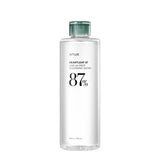 ProtoClinical k-beauty Anua Heartleaf 87 Low pH Deep Cleansing Water 500g single upright pale blue cleansing water bottle centered on a light background with soft peach side accents.