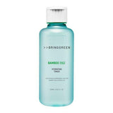 ProtoClinical k-beauty pale green beauty product silhouette centered on a light background with soft lavender side accents.