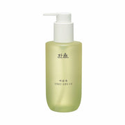 ProtoClinical k-beauty yellow-green vertical beauty product silhouette on a light background with pale blue side accents.