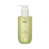 ProtoClinical k-beauty yellow-green vertical beauty product silhouette on a light background with pale blue side accents.