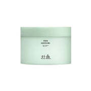 ProtoClinical k-beauty soft teal beauty graphic with two rounded product shapes on a light background.
