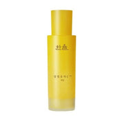 ProtoClinical k-beauty beauty product packaging with an olive vertical center and pale blue side panels on a light background.