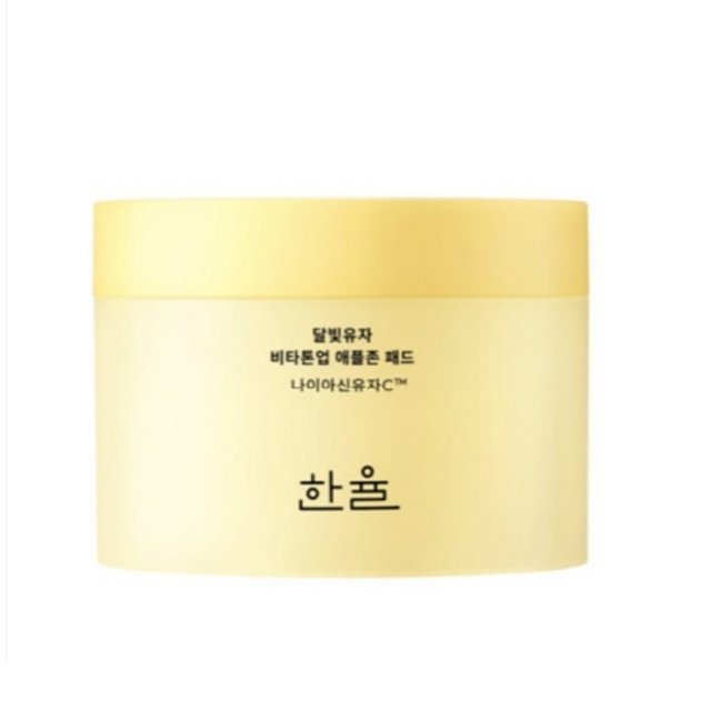 ProtoClinical k-beauty beauty product packaging with a warm beige center and pale blue side panels on a light background.