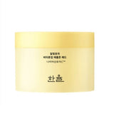 ProtoClinical k-beauty beauty product packaging with a warm beige center and pale blue side panels on a light background.